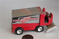 SMALL RED WING ZAMBONI AND STANLEY CUP PUCK