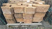 Pallet of retaining wall blocks. 3 high by 4