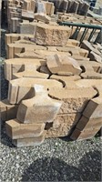 Pallet of retaining wall blocks. 3 high by 4