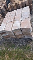 Pallet of retaining wall caps. 5 blocks high by 4