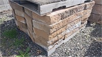 Pallet of retaining wall caps. 5 blocks high by 4