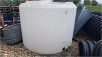 1500 gallon poly tank. Has a couple holes on top