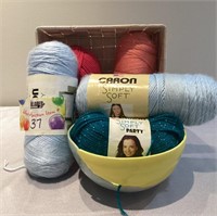 Colourful Caron yarns with yarn bowl