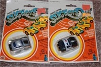 2 NEW IN PACKAGE "SLICKERS" CARS