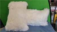 Two White Furry Pillows