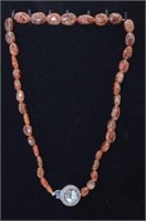 BROWN BEAD NECKLACE WITH AMETHYST & DIAMOND CLASP