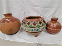 2 Native American southwestern red clay vessels.