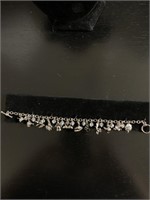 Season charm bracelet with a toggle clasp Glass