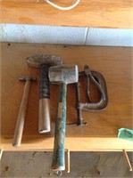 Assorted hammers and C clamp