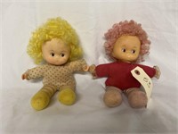 Yellow and Pink sister dolls. Pink is missing a