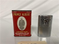 Prince Albert pipe tobacco can, with lighter.
