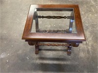 Glass top end table. 27”x22”