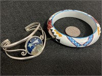 Bracelets, inlaid abalone cuff and plastic Navaho