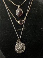 Dark amber, purple jewel and sterling Iowa pendant