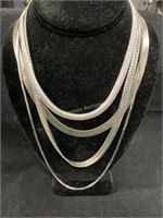 Silver colored chains necklaces