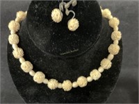 Carved ivory look necklace and earrings