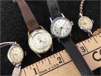 Watches, one damaged crystal