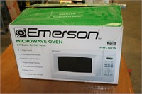 Emerson .7 cu ft microwave. New in box