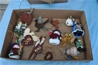box of christmas ornaments and santas