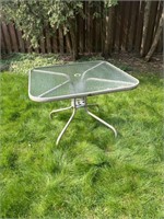 Glass top patio table   - X