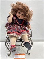 Porcelain Female Doll on Metal Chair