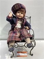 Porcelain Male Doll on Metal Seat