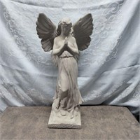 Plaster angel statue