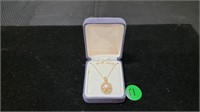 10K GOLD NECKLACE WITH 10K CHARM 1.1 DWT