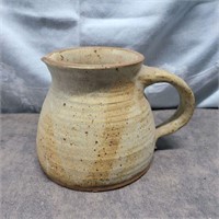 Signed pottery pitcher