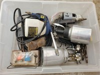 tote of paint spray guns and more