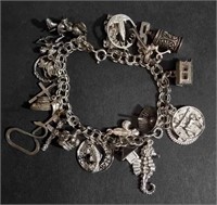 STERLING SILVER CHARM BRACELET WITH CHARMS