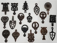 Collection of 18 Mini Cast Iron Trivets