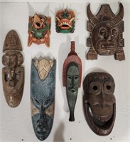 Collection of 7 Hand Carved & Painted Tribal Masks