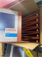 Full box of new orange binders 1” Staples
