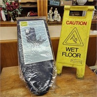 Wet floor sign and small ironing board