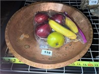 large copper dish and plastic fruit