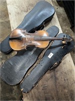 one violin and 3 cases
