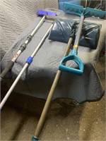 Pair of snow shovels, a washing brush, and