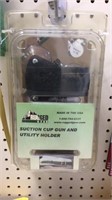 SUCTION CUP GUN AND UTILITY HOLDER