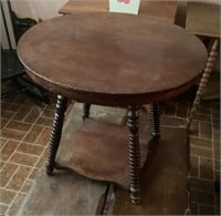 Round parlor table with legs made shorter
