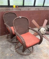 Two Swivel Lawn Chairs