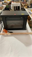 Small electric fireplace heater untested
