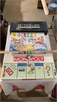 Board games including life, monopoly, Pictionary