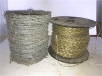 Roll of Barbed Wire and a Roll of Electric Fence