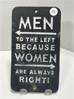Cast Iron sign “ Men to the left, Women to the