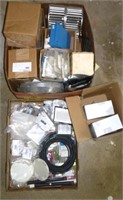 2 boxes of electrical supplies