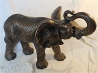 Antique Indian wooden elephant with ivory tusks
