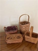Four small Longaberger  baskets