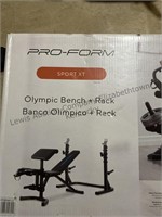 Pro-form Olympic bench plus rack weights included