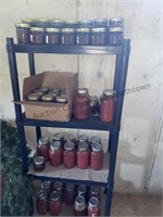 Plastic shelves with an assortment of canning